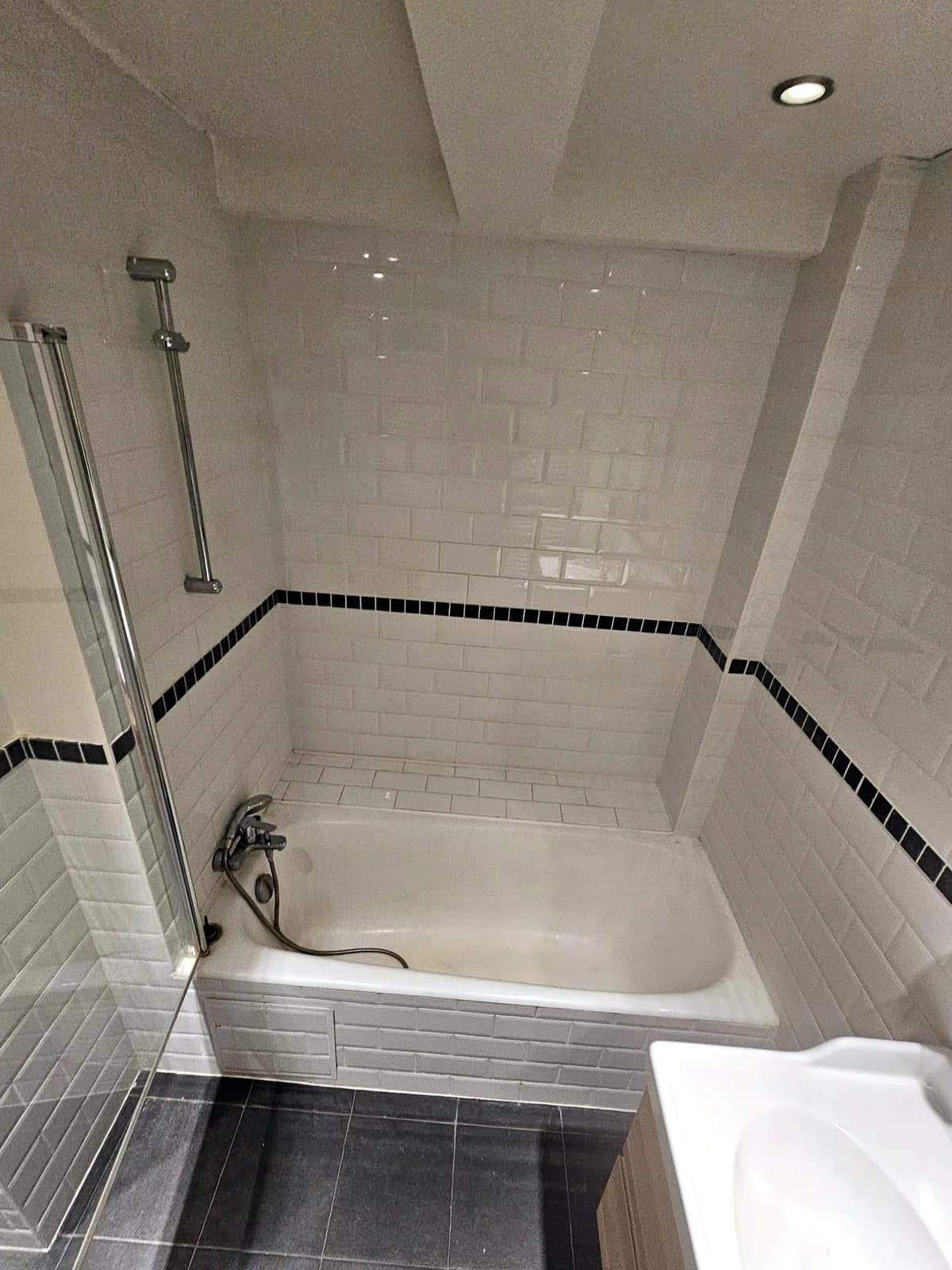 Complete bathroom in metro tiling, before the work